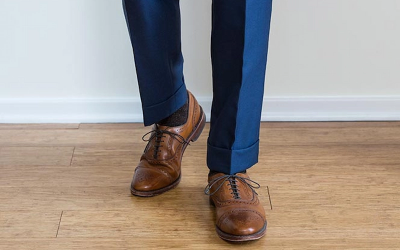 Brown dress shoes with navy trousers
