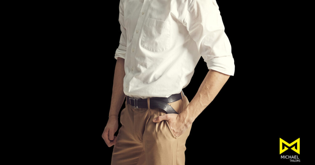 Man in white shirt and beige pants