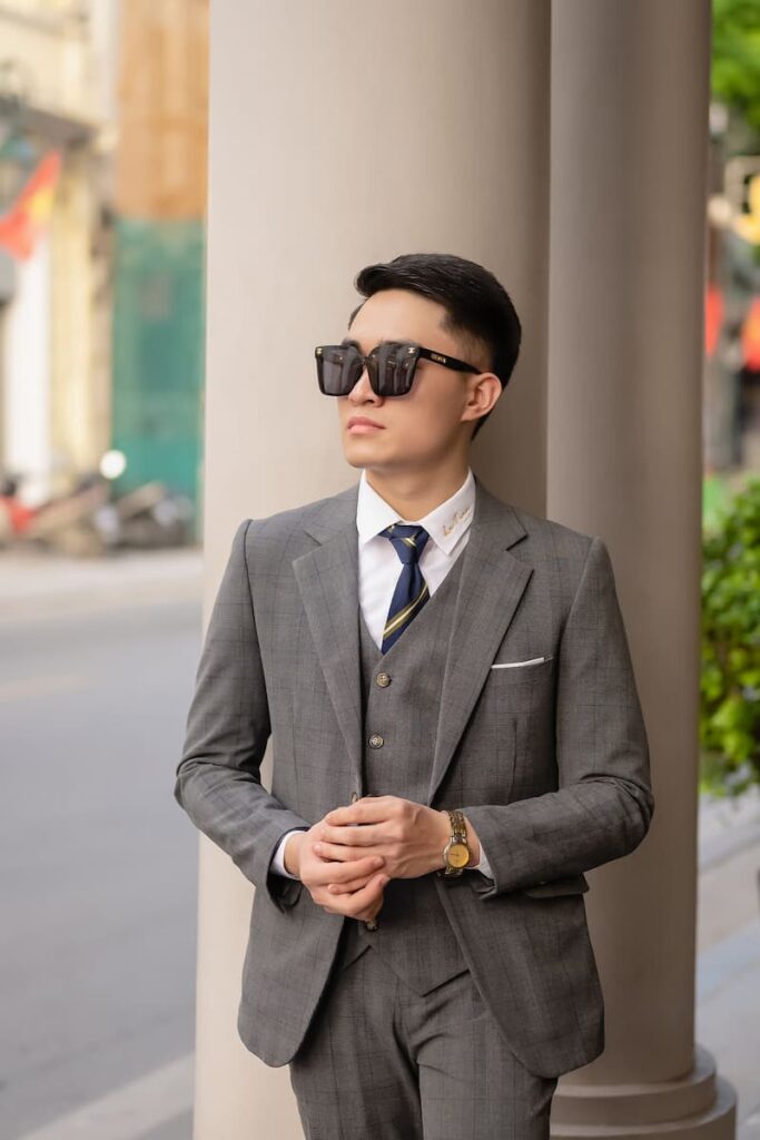 Man in gray suit and sunglasses