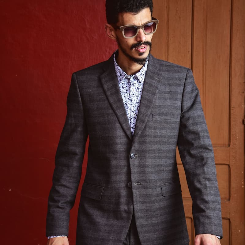 Man in stylish suit and sunglasses