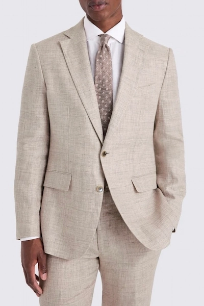 Man in a light beige suit
